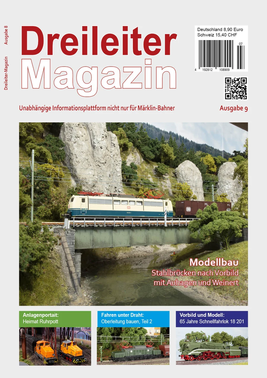 Titelmotiv der Dreileiter-Ausgabe 9: Elektrolok mit Güterzug auf einer Stahlbrücke in felsiger Modellbahnlandschaft